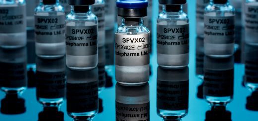 Multiple glass vials labeled SPVX02 on a reflective blue surface, suggesting a pharmaceutical or vaccine production scene.