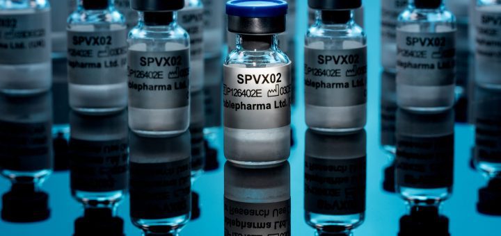 Multiple glass vials labeled SPVX02 on a reflective blue surface, suggesting a pharmaceutical or vaccine production scene.